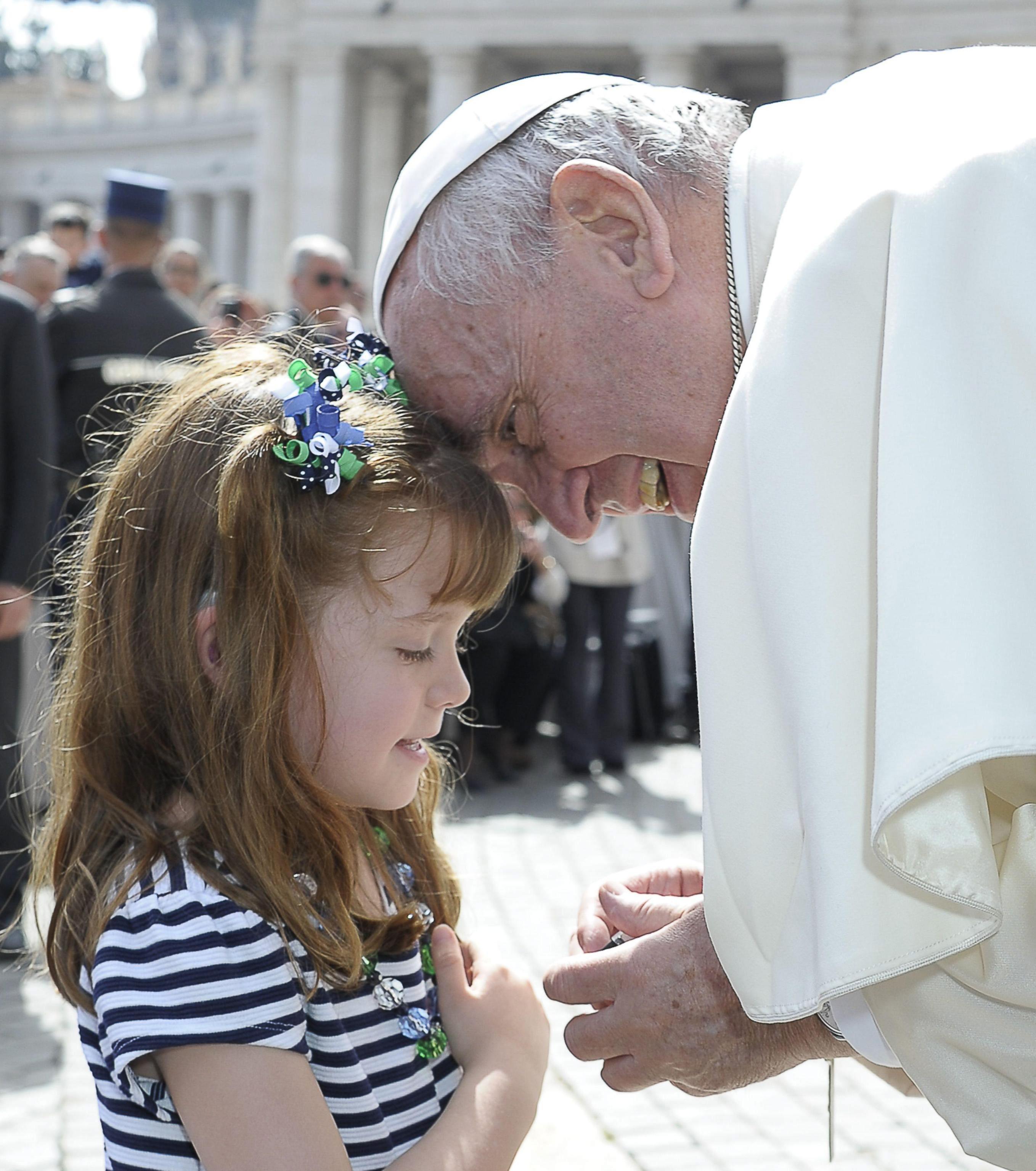 Pope Francis greets Lizzy